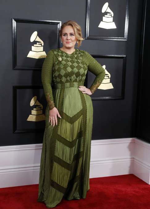 Adele arrives at the 59th annual Grammy Awards. Photo: EPA