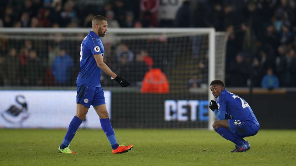 Leicester’s Demarai Gray and Islam Slimani look dejected after the match. Photo: Reuters