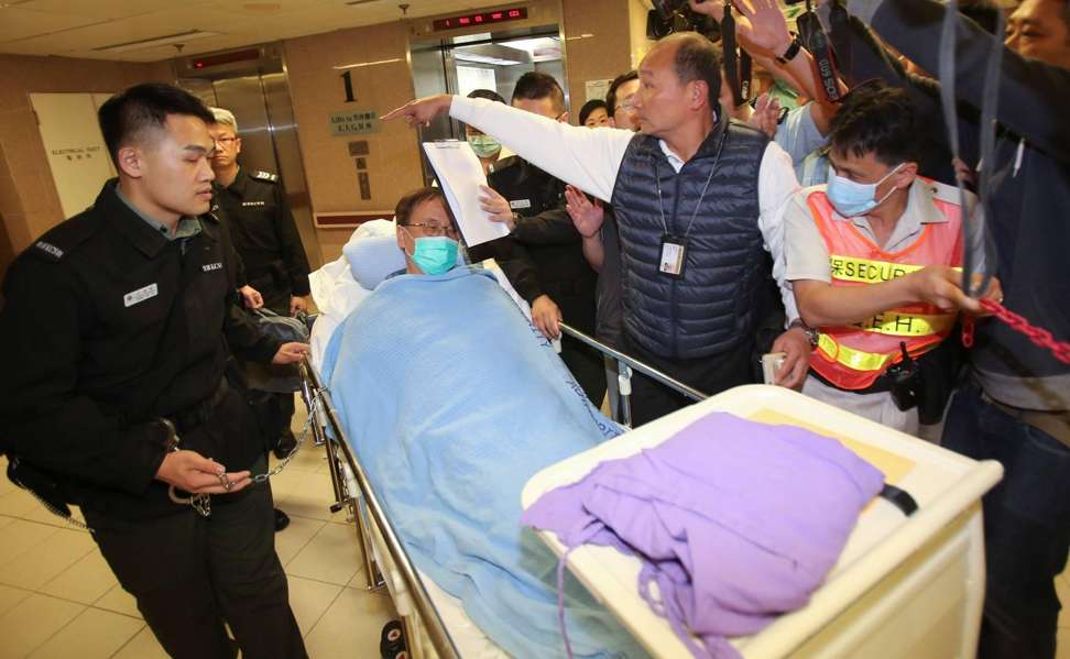 Former chief executive Donald Tsang is wheeled into the custodial ward of Queen Elizabeth Hospital. Photo: Handout