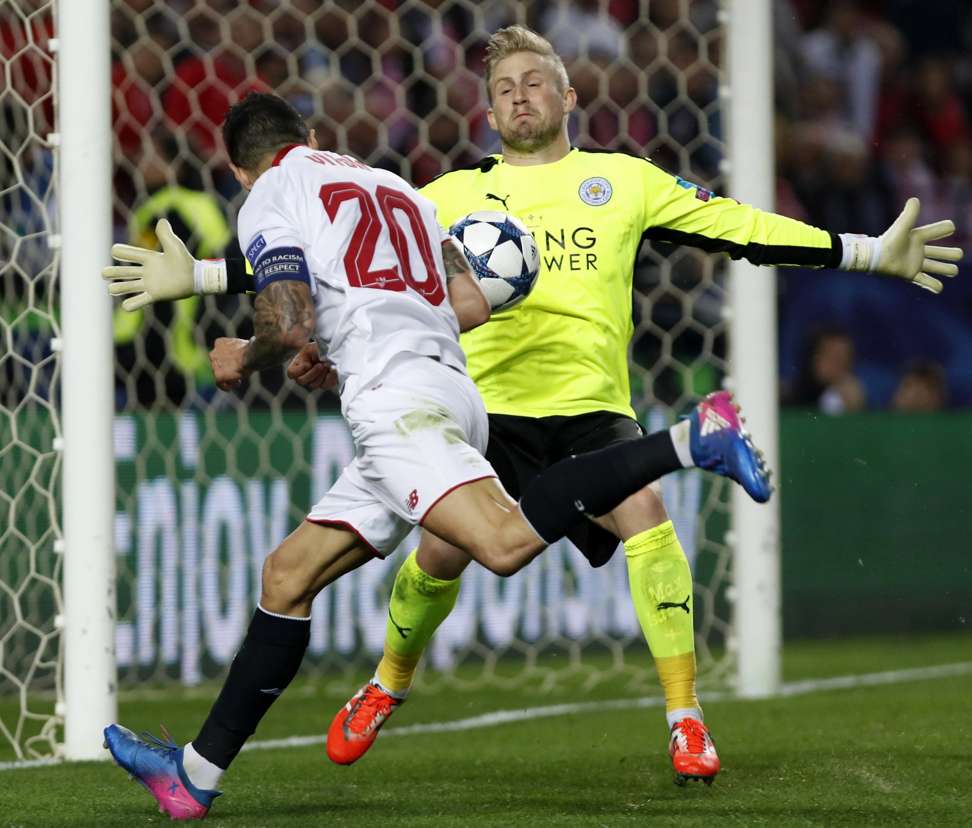 Sevilla’s Victor Machin in action against Leicester’s Kasper Schmeichel. Photo: EPA