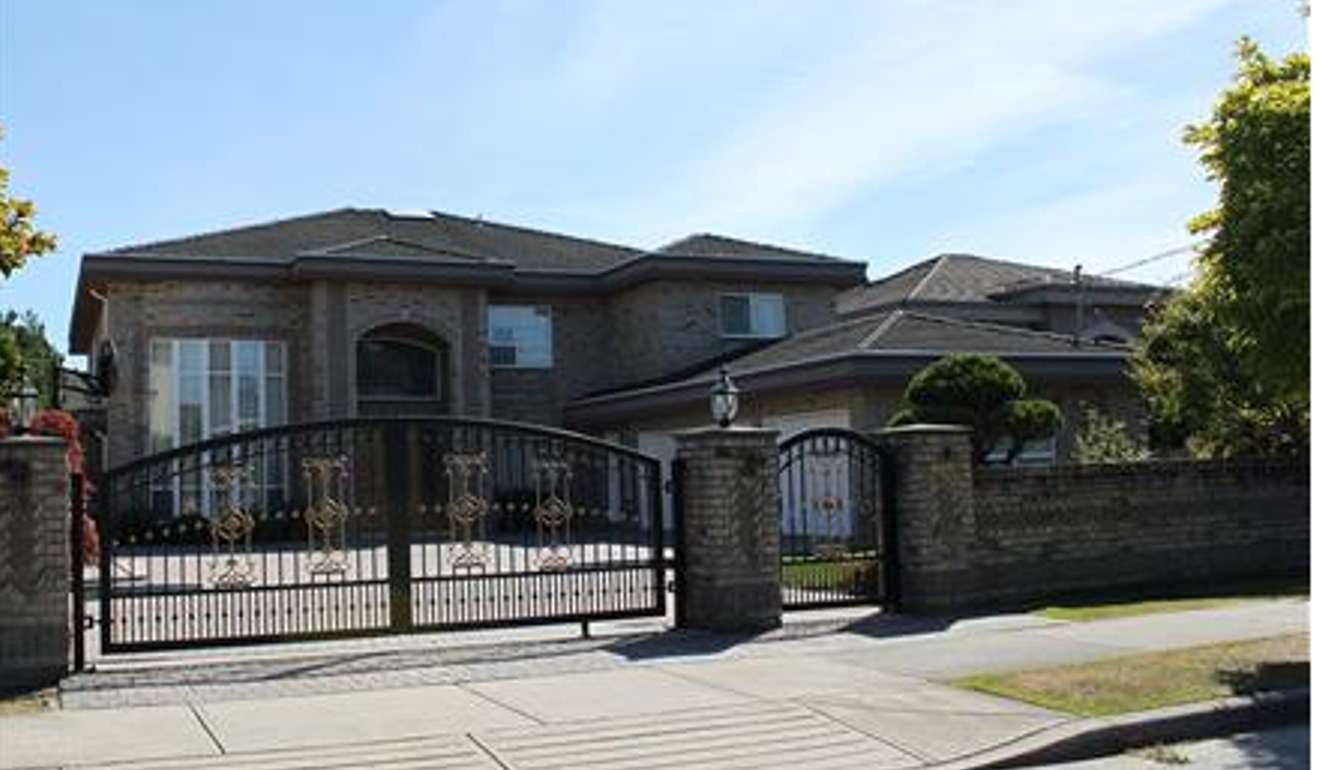 A C$3.56 million mansion at 6620 Mang Road, Richmond, BC, that was purchased by Chinese fraudsters involved in the theft of US$485 million from the Bank of China. Two other houses were purchased nearby. Photo: BC Assessment