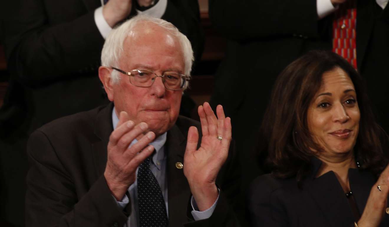 Senator Bernie Sanders applauds as Trump addresses the US Congress. Photo: Reuters