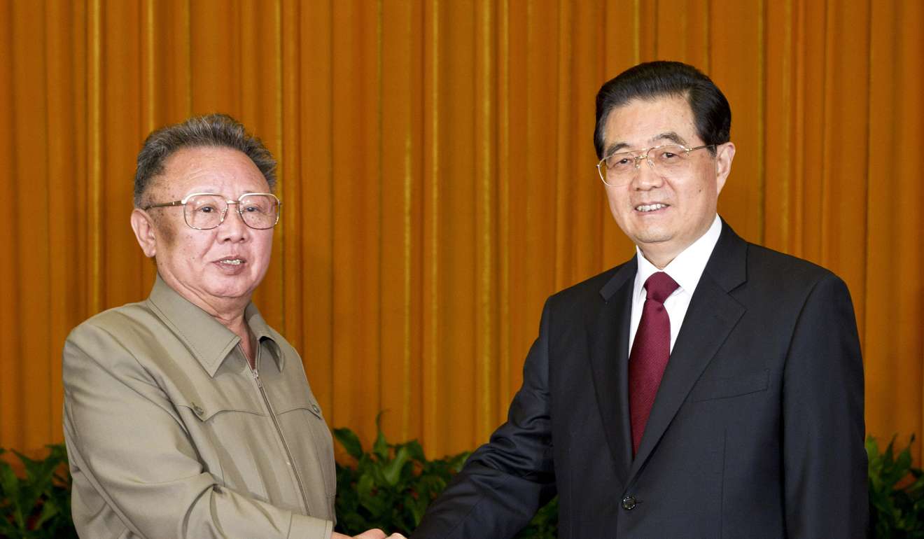 Kim Jong-il, left, shakes hands with Chinese President Hu Jintao in Beijing. Photo: AP