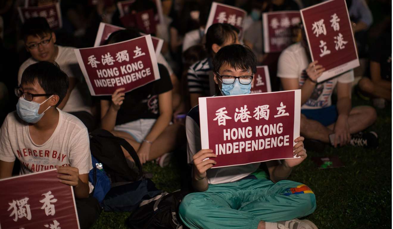 Supporters hold signs for Hong Kong independence during a rally organised by the pro-independence Hong Kong National Party in Tamar Park last year. Perhaps it is the disappearance of a Hong Kong destiny that buoyed the protests of some young people shouting for independence, as if independence could bring back the hopes and opportunities once tied to Hong Kong. Photo: EPA