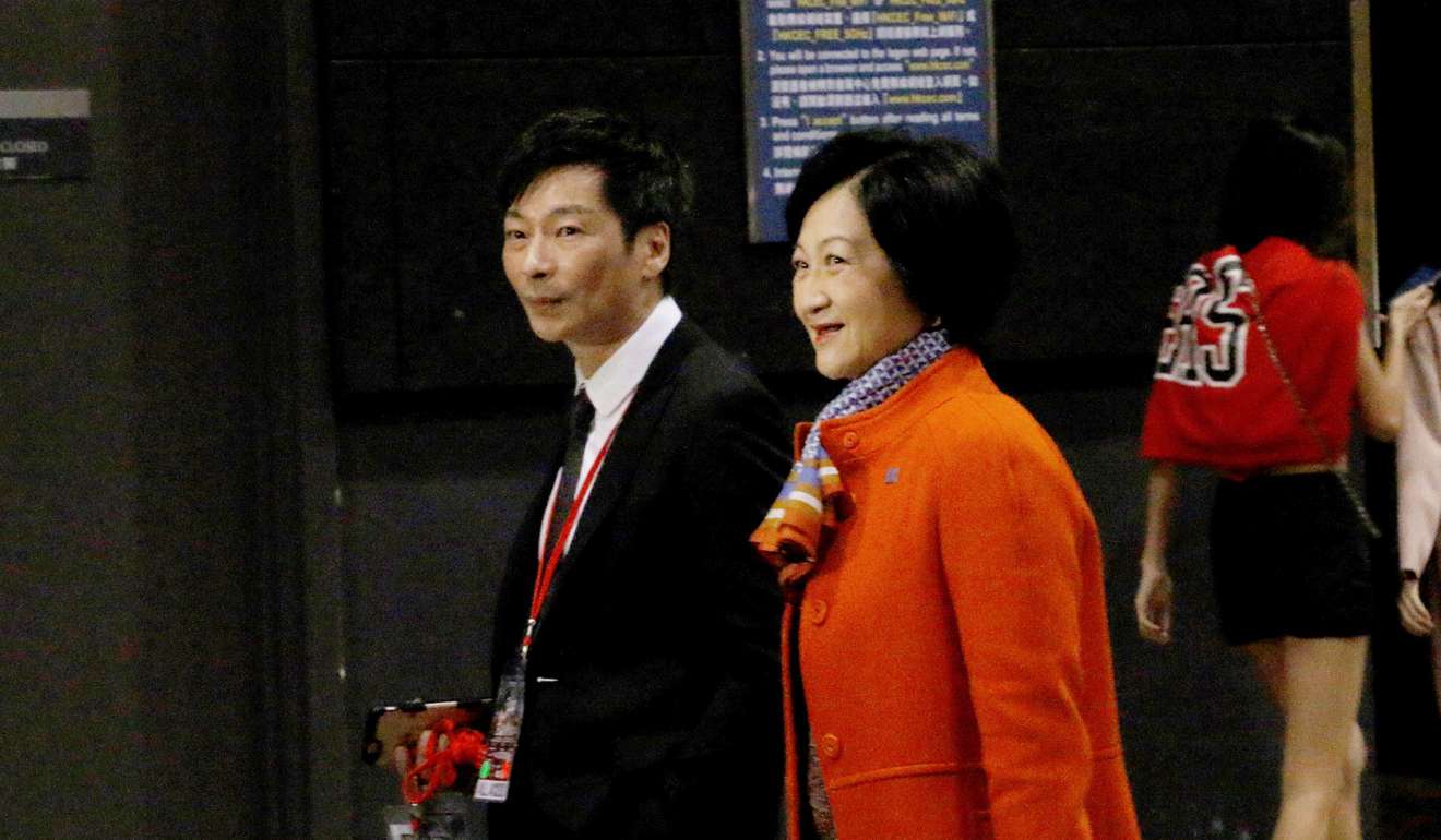 Politician Regina Ip arrives for Clash of Champions 2 with Rex Tso's manager, Jay Lau Chi-yuen. Photo: Unus Alladin