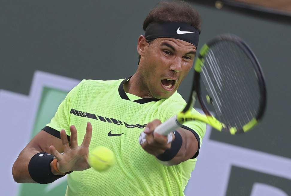 Rafa Nadal was beaten in just 68 minutes by old for Roger Federer. Photo: EPA
