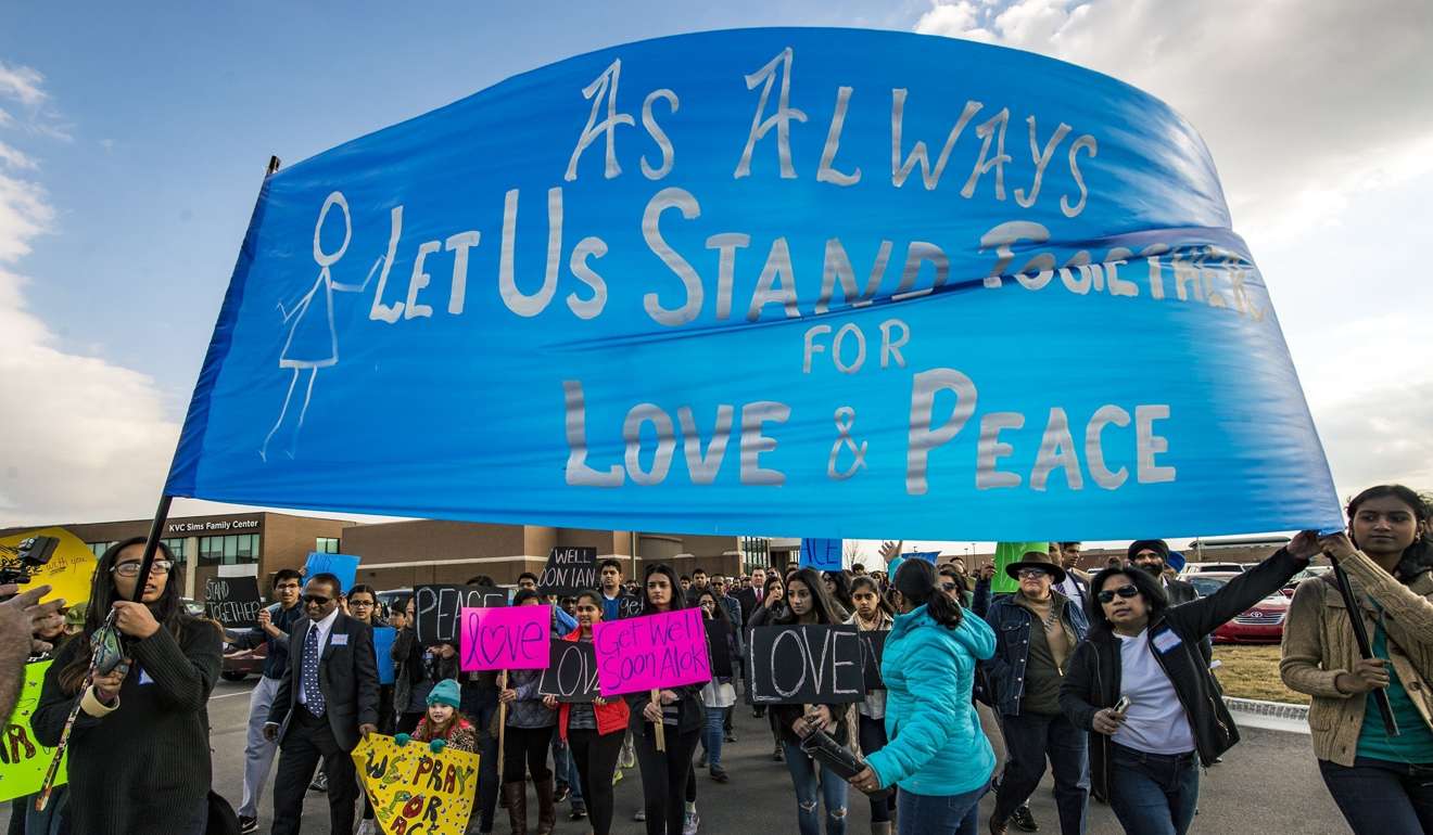 Hundreds of people march for peace around the Ball Conference Centre in Olathe, Kansas, before starting a prayer vigil in response to the deadly shooting of Srinivas Kuchibhotla. Photo: AP