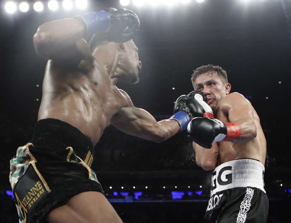 Jacobs punches Golovkin in the fifth round. Photo: AP