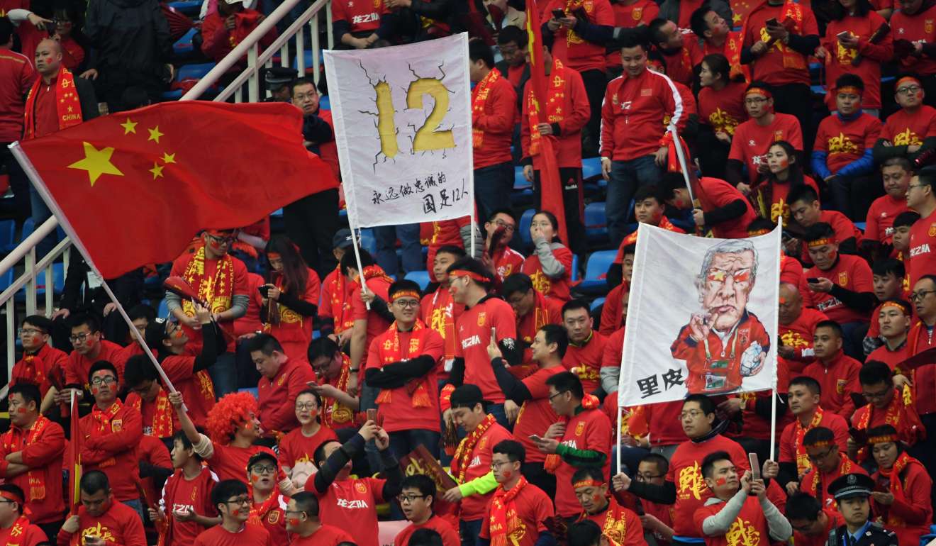 China fans at He Long Stadium. Photo: Xinhua队主场迎战韩国队。 新华社记者李尕摄