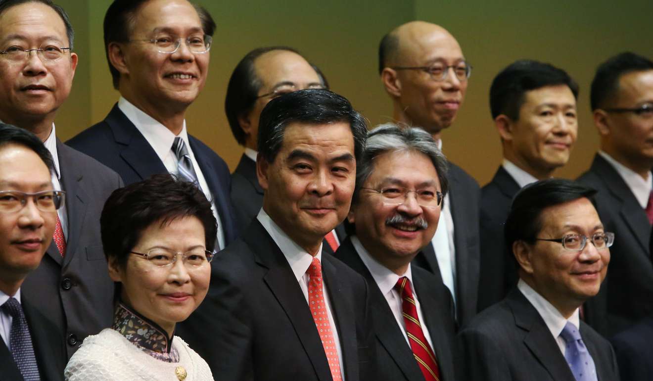 Carrie Lam stands with peers in the administration of Chief Executive Leung Chun-ying. Photo: Felix Wong