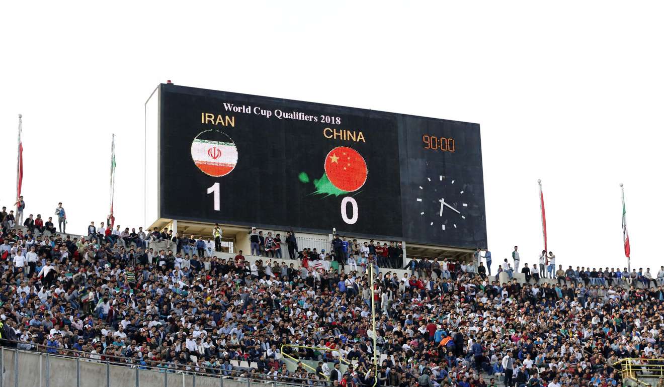 A digital billboard shows the results during the 2018 World Cup qualifying football match between Iran and China at the Azadi Stadium in Tehran. Photo: AFP