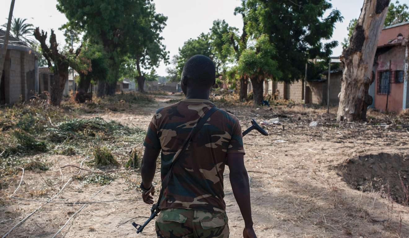 A soldier patrols the streets of Bama, in northeast Nigeria, last December 8. The once-bustling trade hub was razed by Boko Haram jihadists, in a conflict that has displaced more than 2.6 million people in northeast Nigeria. Photo: AFP