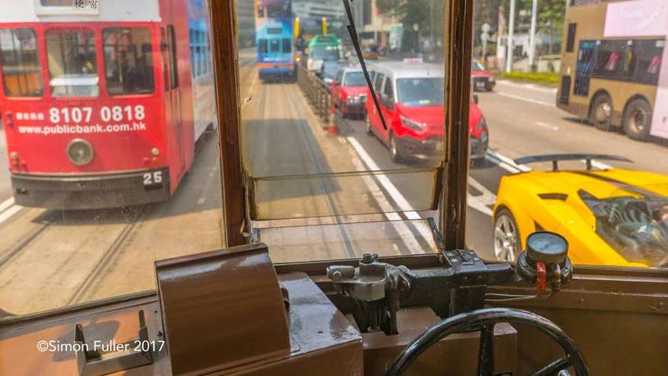 Simon Fuller took some of his photographs from inside trams.