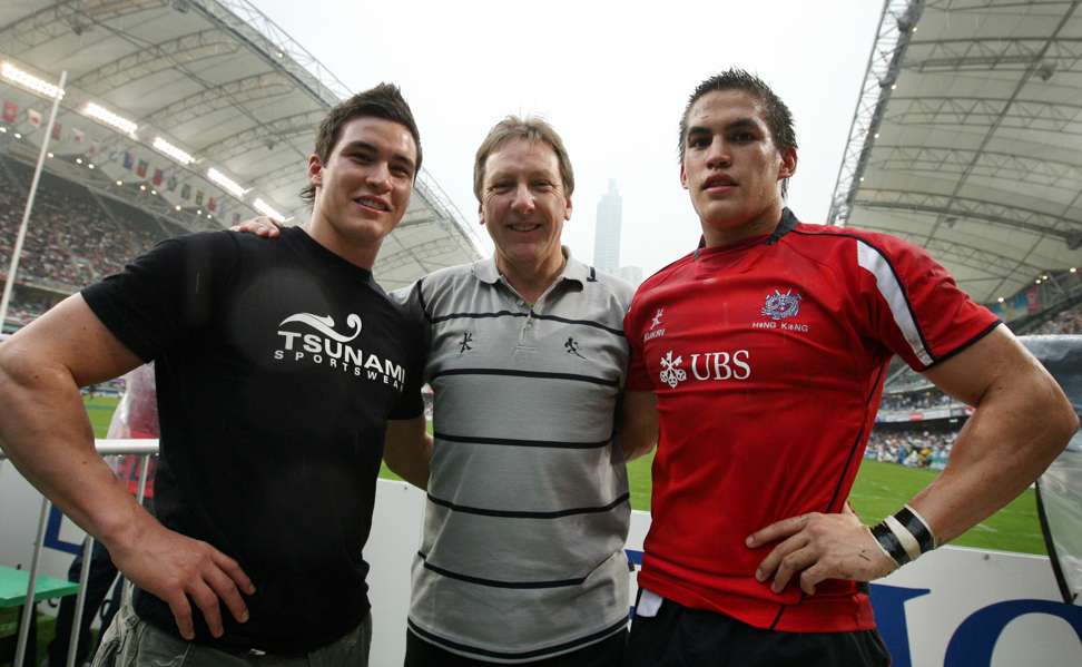Hong Kong Rugby Football Union director Mike Haynes (C) with sons Edward (L) and Anthony at the Hong Kong Sevens in 2009. Photo: Ricky Chung
