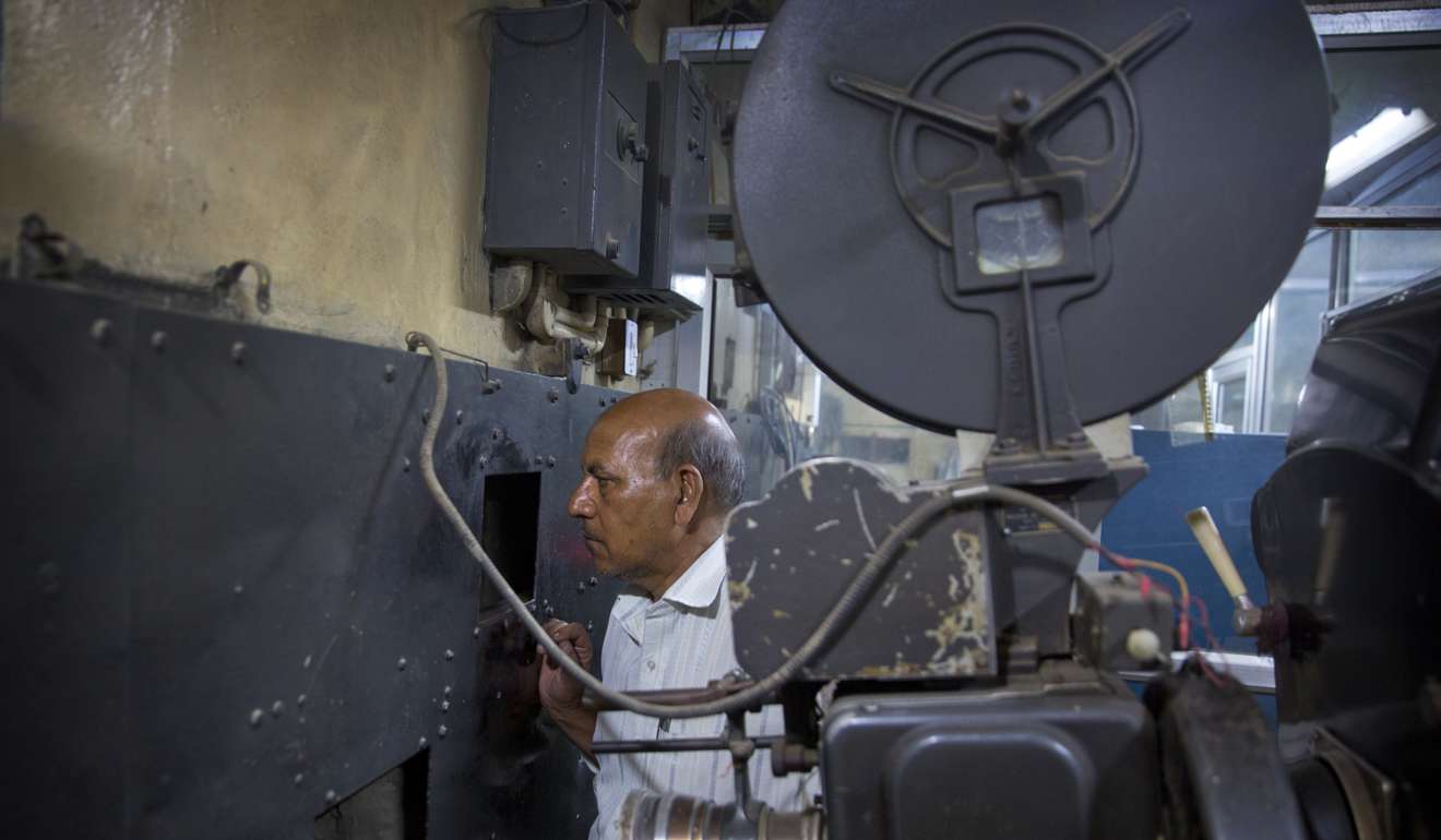 Ramesh Kumar Saha, a technician in a projection room for the last 22 years. Photo: AP