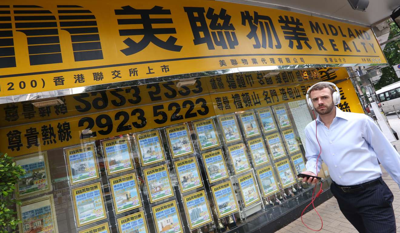 Midland owns and operates 625 “Midland Realty” branded branches in Hong Kong and employs 11,425 staff. Photo: Nota Tam
