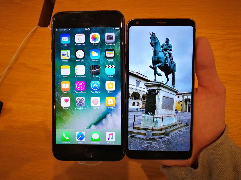 The LG G6 (right) with the iPhone 7 Plus shows the drastic size difference between the two phones. The G6 has a larger display despite having a much smaller body. Photo: Ben Sin
