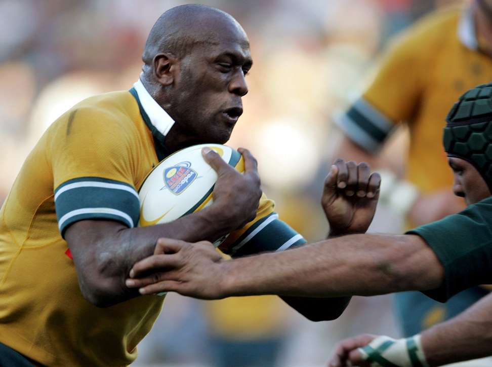 Australian wing Wendell Sailor charges the South African defence in Johannesburg in 2005. Photo: EPA