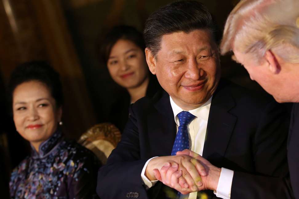 President Xi Jinping shakes hands with President Donald Trump as first lady Peng Liyuan looks on during a dinner at Trump’s Mar-a-Lago estate in West Palm Beach, Florida. The US launching of an attack on Syria, during a dinner in which the principal objective of the Chinese leader was to project himself as a commanding presence, probably did not produce a net increase in trust. Photo: Reuters