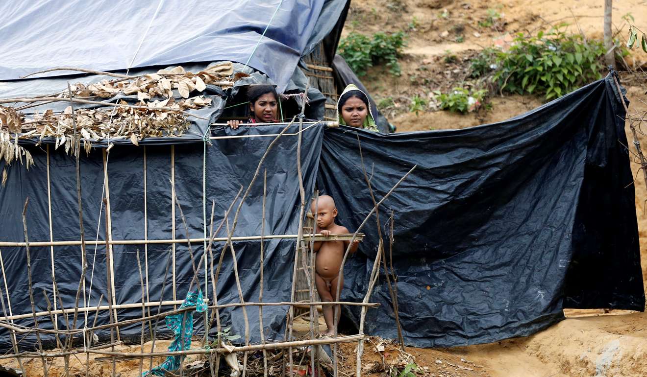Rohingya refugees look on at the Balukhali Makeshift Refugee Camp in Cox's Bazar. Photo: Reuters
