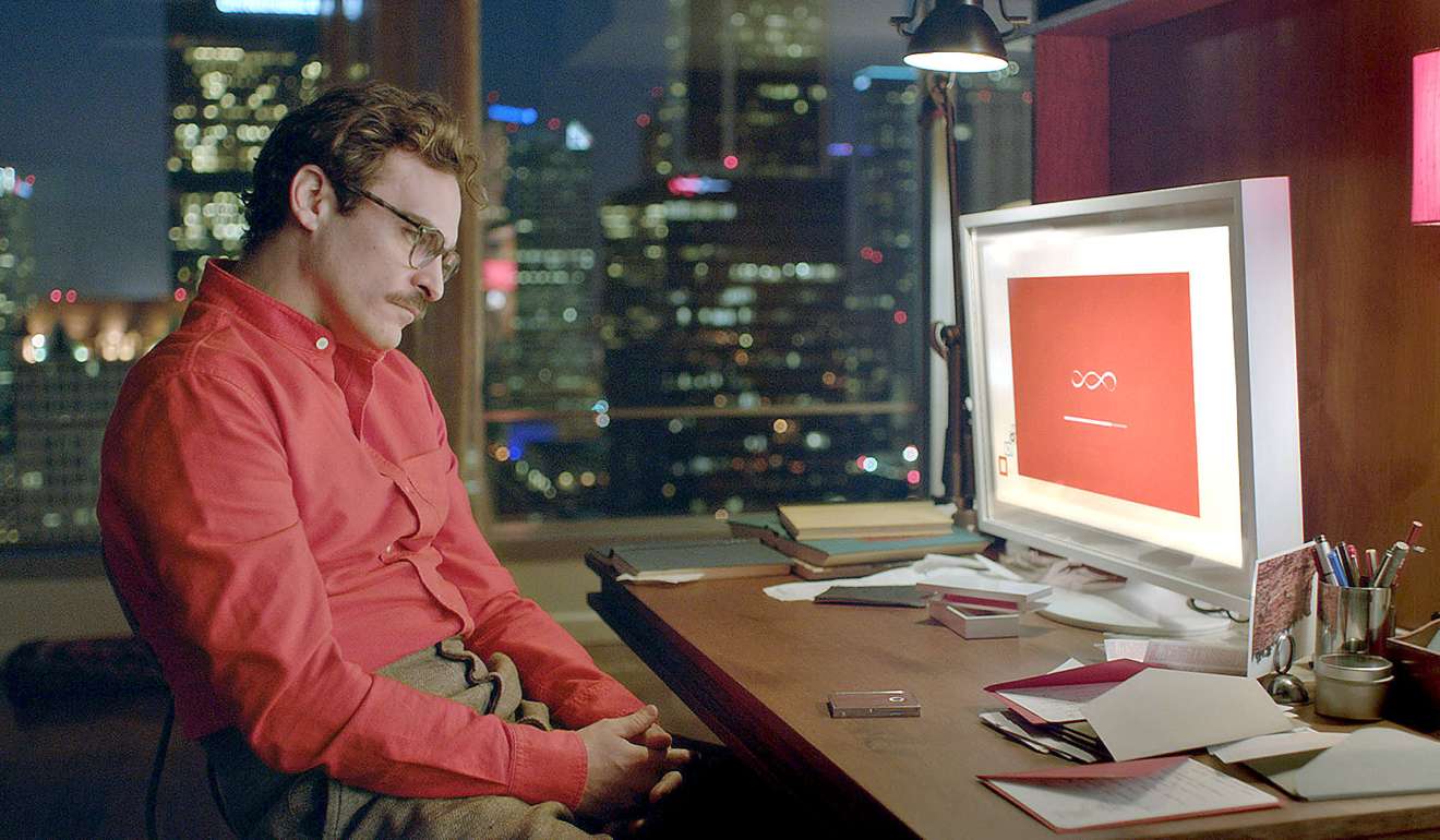 Joaquin Phoenix interacts with a voice assistant in 2013 film Her.