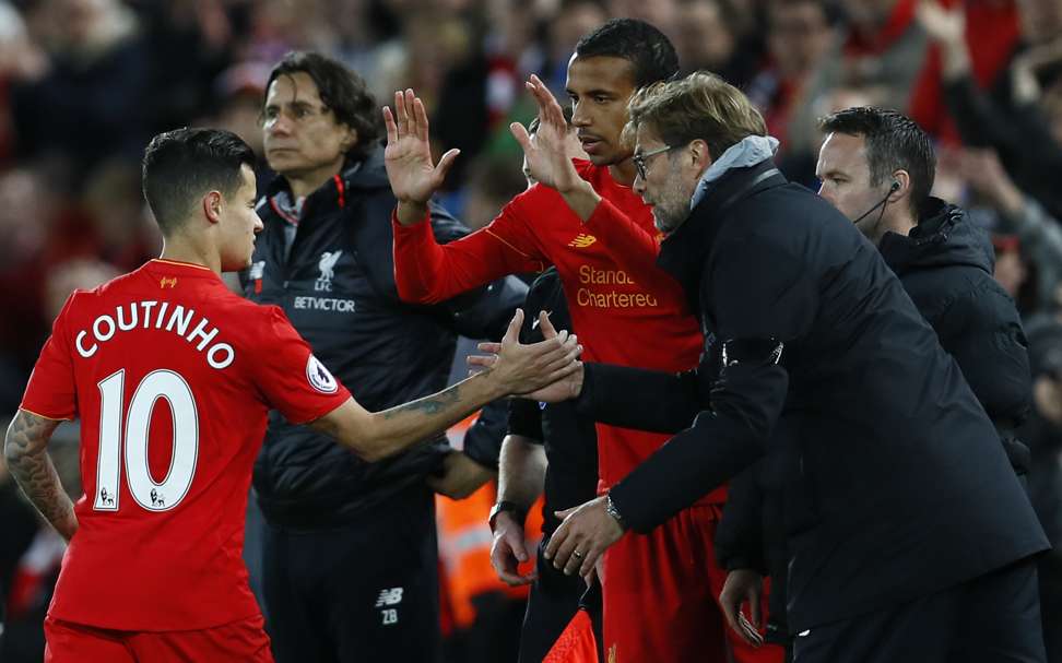 Liverpool's Joel Matip comes on as a substitute to replace Philippe Coutinho as Liverpool manager Juergen Klopp looks on. Photo: Reuters