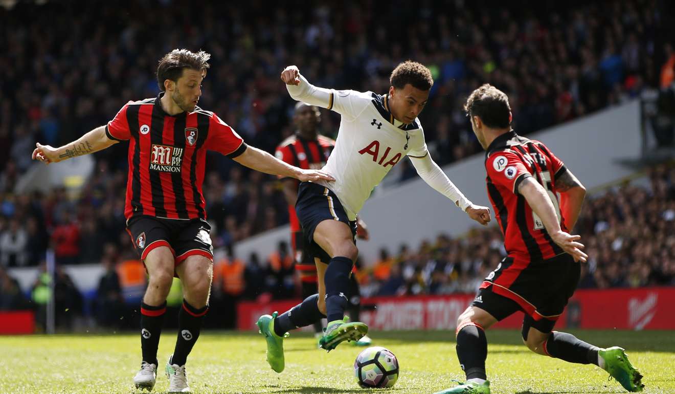 Tottenham's Dele Alli is confronted by Bournemouth's Adam Smith and Harry Arter. Photo: Reuters