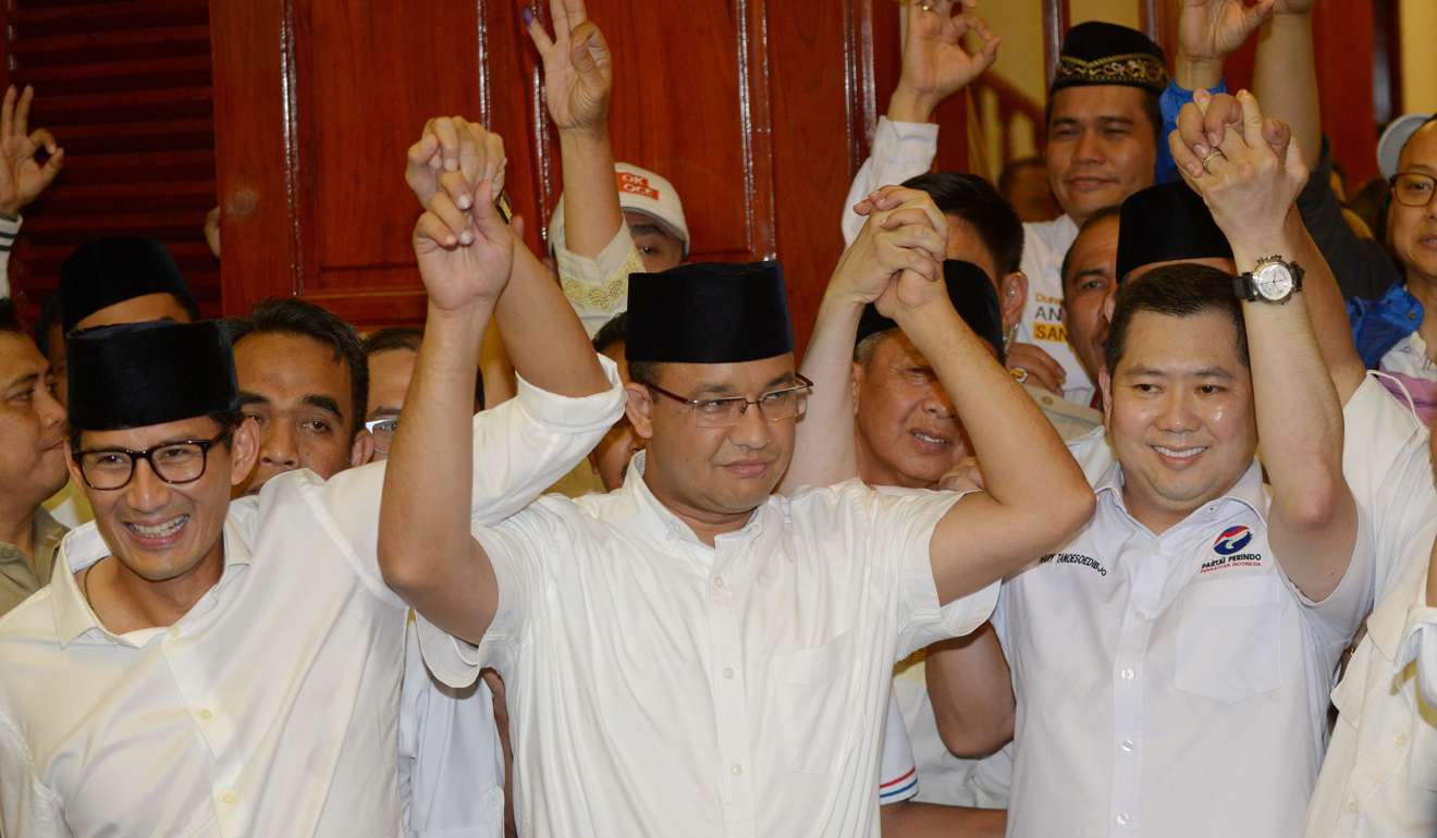 Jakarta governor-elect Anis Baswedan (centre). Photo: AFP
