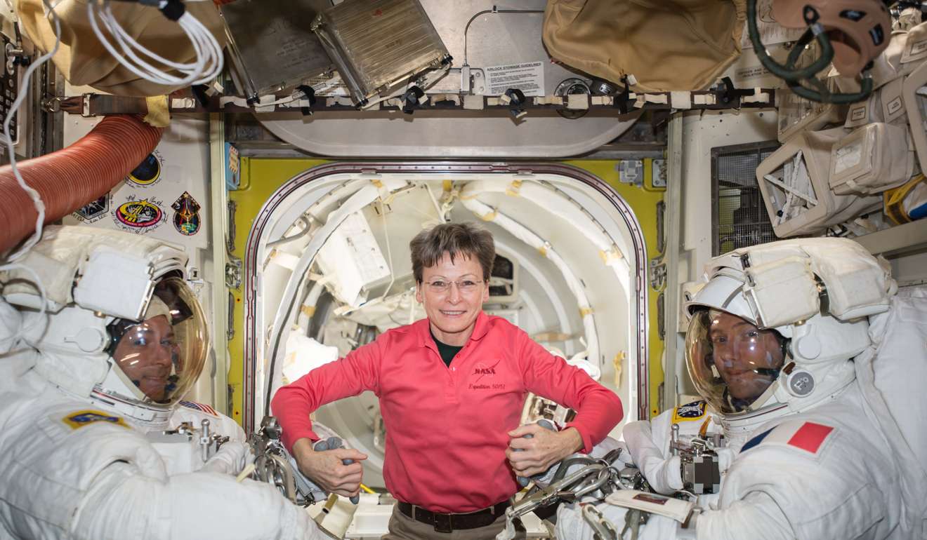 NASA astronaut Peggy Whitson (C) posing with Expedition 50 Commander Shane Kimbrough of NASA (L) and Flight Engineer Thomas Pesquet of ESA (European Space Agency, R) prior to their spacewalk. Whitson officially set the US record for most cumulative days in space aboard the International Space Station (ISS). Photo: NASA handout via EPA