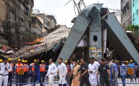 Officials visit the site of a collapsed flyover in Kolkata. Rescue officials said there are no more survivors trapped under the rubble of a flyover that collapsed killing at least 24 people, as Indian police detained five construction company staff over the accident. Photo: AFP Officials visit the site of a collapsed flyover in Kolkata. Rescue officials said there are no more survivors trapped under the rubble of a flyover that collapsed killing at least 24 people, as Indian police detained five construction company staff over the accident. Photo: AFP