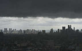 Dark storm clouds over the Manila skyline. Before Singapore, before Hong Kong, Manila was the undisputed centre of commerce in Asia Pacific. Photo: AFP Dark storm clouds over the Manila skyline. Before Singapore, before Hong Kong, Manila was the undisputed centre of commerce in Asia Pacific. Photo: AFP