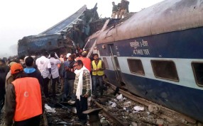 Indian rescue workers search for survivors in the wreckage of the train. Photo: AFP