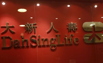 A company logo of Dah Sing Life is displayed at the reception of its office in Hong Kong. Photo Reuters, Bobby Yip