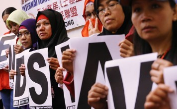 The Asian Migrants’ Coordinating Body protests against slavery. Photo: Felix Wong