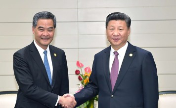 The meeting between President Xi Jinping and Leung Chun-ying on the sidelines of the Asia-Pacific Economic Cooperation forum in Peru has led to much speculation. Photo: Xinhua