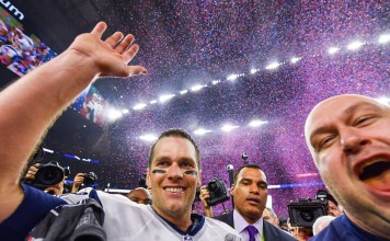 New England Patriots quarterback Tom Brady celebrates during the post-game ceremony for Super Bowl LI. Photo: TNS