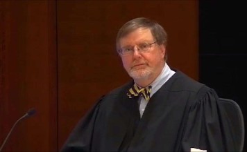 In this framegrab from video released by the United States Courts, US District Judge James Robart on Friday rules on the travel ban imposed by US President Donald Trump. Photo: AFP