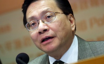 Housing minister Professor Anthony Cheung says it would have taken a magician to put things right in the property market. Photo: K. Y. Cheng