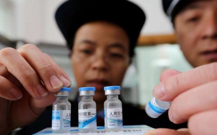 State Food and Drug Administration officials check the vaccines stored in the local Centre for Disease Control in Rong’an county, Guangxi Zhuang Autonomous Region, China. Photo: EPA State Food and Drug Administration officials check the vaccines stored in the local Centre for Disease Control in Rong’an county, Guangxi Zhuang Autonomous Region, China. Photo: EPA