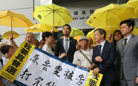 Judge convinced beyond reasonable doubt that social worker poured liquid that smelled like urine on 11 officers, but acquitted Tsang of two out of four counts of resisting arrest