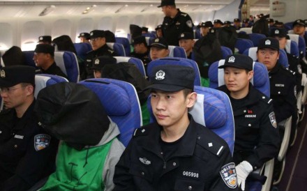 Mainland police flying back to China after apprehending phone scam suspects in Kenya in April. Photo: Xinhua