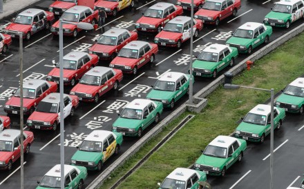 Hong Kong’s taxi drivers: hustling businessmen, or the victims of the government’s system? Photo: AFP