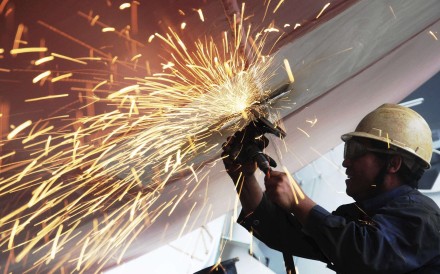 A file picture of a shipyard worker in Shandong province. Photo: Reuters