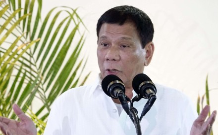 Filipino President Rodrigo Duterte speaks during a departure ceremony at the international airport in Davao City. Photo: EPA