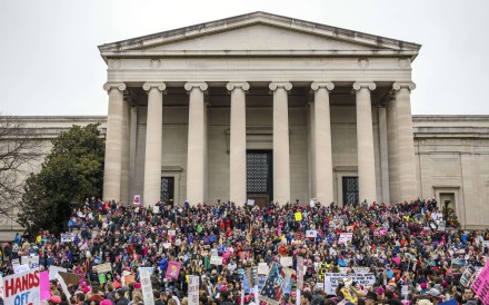 Demonstrators wait for the march to begin on the National Mall during the Women's March on Washington, D.C. Photo: TNS