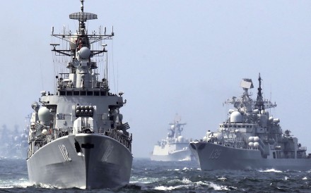 The guided missile destroyer Harbin (left) was part of the Chinese navy task force that left Kuwait on Sunday after visits to four Persian Gulf states. Photo: AP