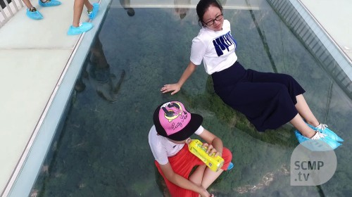 China opens longest glass bottom bridge in world