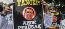 Muslims demand police prosecute the Jakarta governor Basuki Tjahaja Purnama for alleged blasphemy. Photo: AFP Muslims demand police prosecute the Jakarta governor Basuki Tjahaja Purnama for alleged blasphemy. Photo: AFP