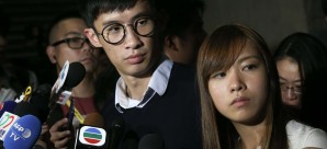 Sixtus Leung and Yau Wai-ching of Youngspiration meet the media outside the High Court. Photo: Dickson Lee