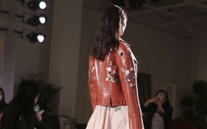 From pyjamas to painterly flower decorations and PVC bomber jackets, Shanghai-based designer’s spring/summer 2017 collection mixed tradition and innovation